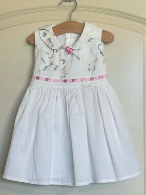 White Embroidered Sleeveless Baby Dress with Pink Trim